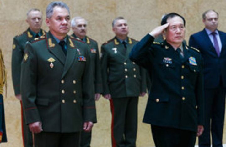 Эксперт: Россия и Китай при общении с Западом стоят "спина к спине"